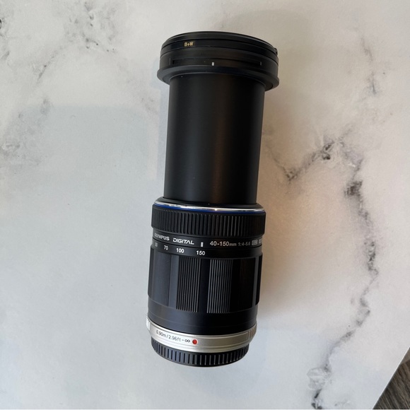 Olympus PEN E-P3 Mirrorless Digital Camera with Accessories and 2 Zoom Lenses - Picture 10 of 16